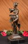 Madaras nőalak bronz szobor